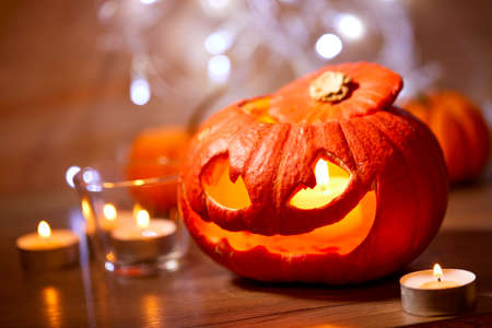 Halloween pumpkin and candlesの写真素材