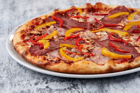 Italian pizza on the white plateの写真素材