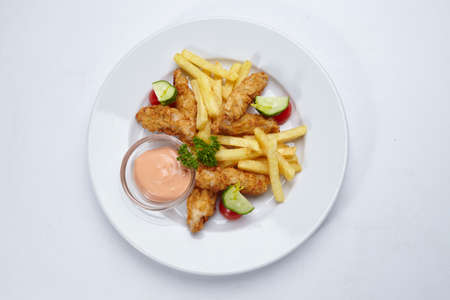 Chicken nuggets with french friesの写真素材