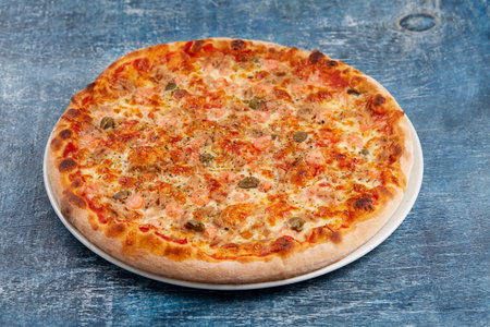 pizza on the wooden backgroundの写真素材