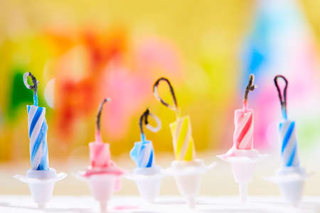 birthday candles on yellow backgroundの写真素材