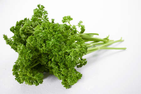 fresh parsley on the whiteの写真素材