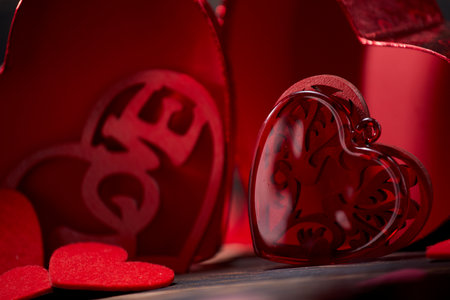 Valentine day greeting card. Hearts on the wooden backgroundの写真素材