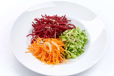raw vegetables on the white plateの写真素材