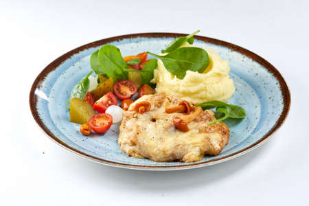 pork with mashed potatoes and vegetablesの写真素材