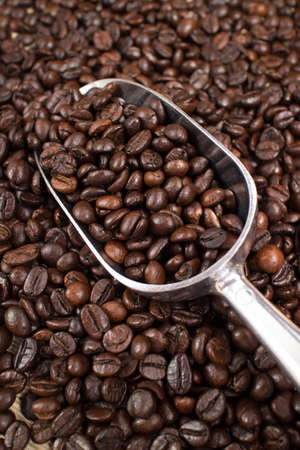 coffee beans in the spoonの写真素材