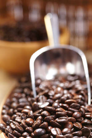 coffee beans in the spoonの写真素材