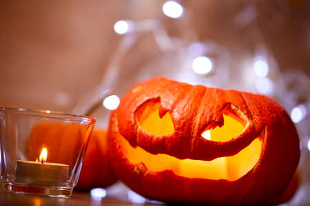 Halloween pumpkin and candle lightsの写真素材