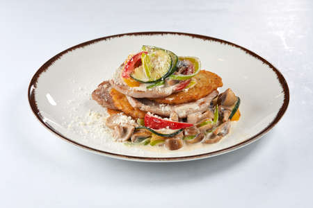 potato pancakes with roasted vegetablesの写真素材