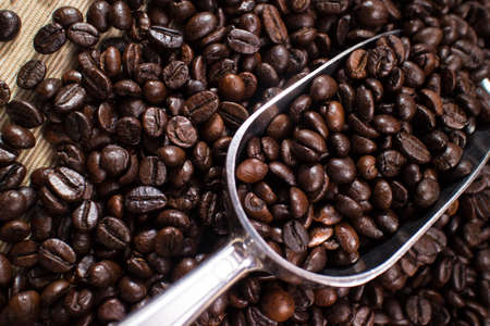 coffee beans in the spoonの写真素材