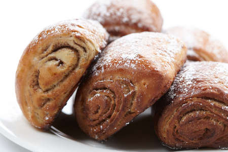 baked sweet buns on the white plateの写真素材
