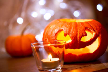 Halloween pumpkin and candle lightsの写真素材