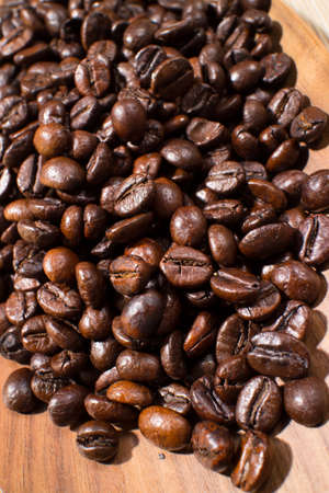 coffee beans in the spoonの写真素材