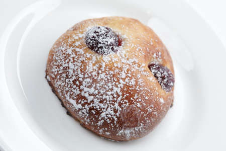 baked sweet buns on the white plateの写真素材