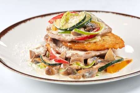 potato pancakes with roasted vegetablesの写真素材
