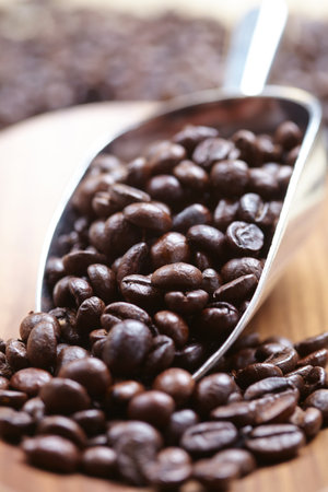 coffee beans in the spoonの写真素材