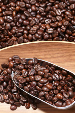 coffee beans in the spoonの写真素材