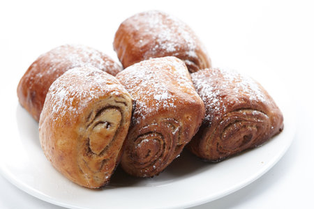 baked sweet buns on the white plateの写真素材