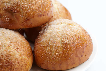 baked sweet buns on the white plateの写真素材