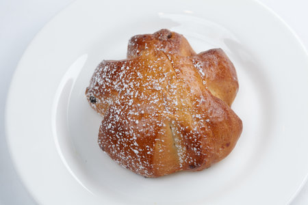 baked sweet buns on the white plateの写真素材