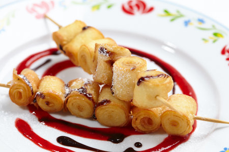 fried sweet rolls with chocolate and jamの写真素材