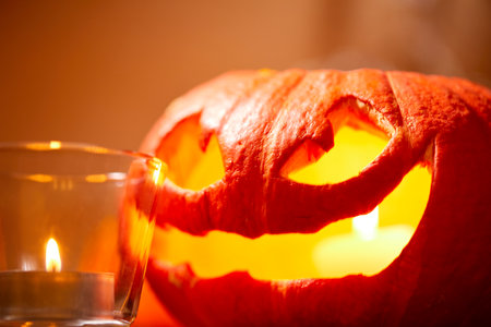 Halloween pumpkin and candle lightsの写真素材