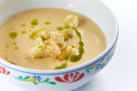 cream soup on the white backgroundの写真素材