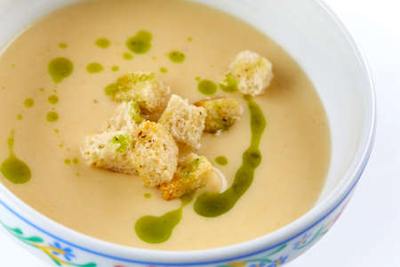 cream soup on the white backgroundの写真素材