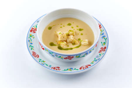 cream soup on the white backgroundの写真素材