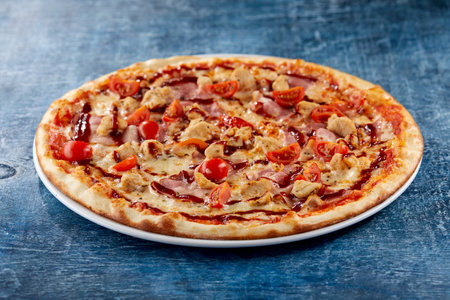 Italian pizza on the dark backgroundの写真素材