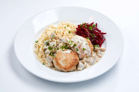 meatballs with barley and saladの写真素材