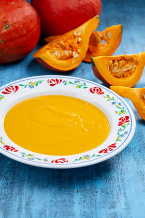 pumpkin cream soup with croutonsの写真素材