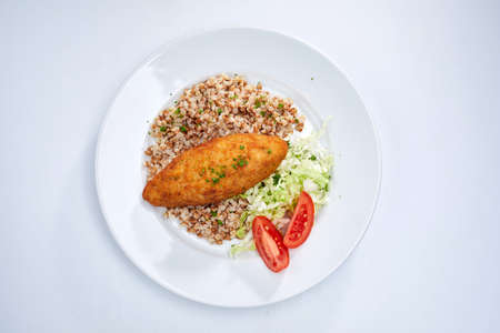 cutlet with buckwheat and saladの写真素材