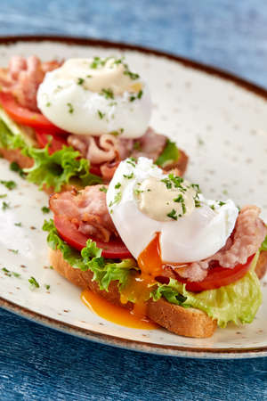 poached eggs on the toastsの写真素材