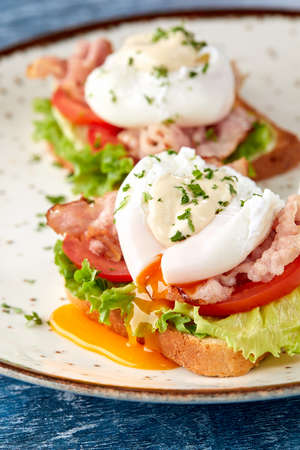 poached eggs on the toastsの写真素材