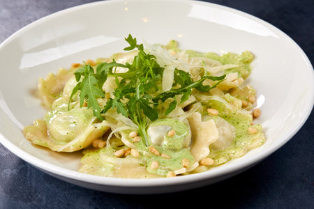 italian ravioli with pesto sauceの写真素材