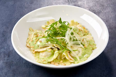 italian ravioli with pesto sauceの写真素材