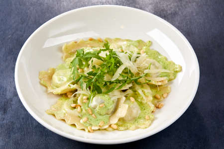 italian ravioli with pesto sauceの写真素材