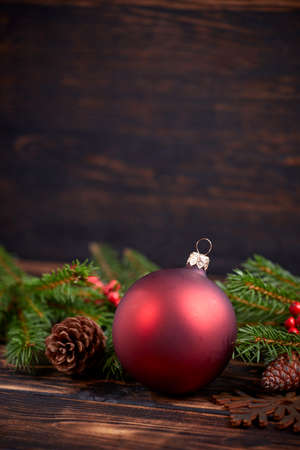 Christmas decoration with ball and fir branchesの写真素材
