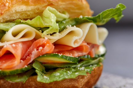 sandwich with bacon, cheee and lettuceの写真素材