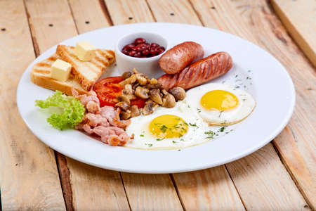 breakfast with sausage and toastsの写真素材