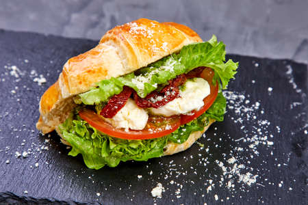 croissant with ham and cheeseの写真素材