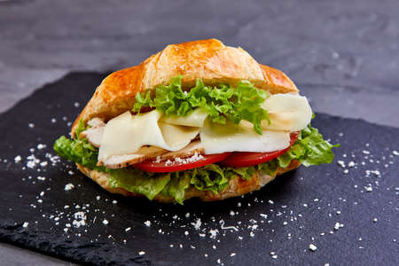 croissant with ham and cheeseの写真素材