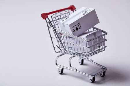 shopping trolley with boxesの写真素材