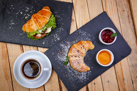 croissant with butter and jamの写真素材