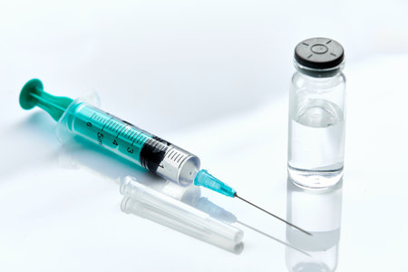 Vaccine in vial with syringeの写真素材