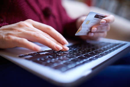Online shopping concept, woman with credit cardの写真素材