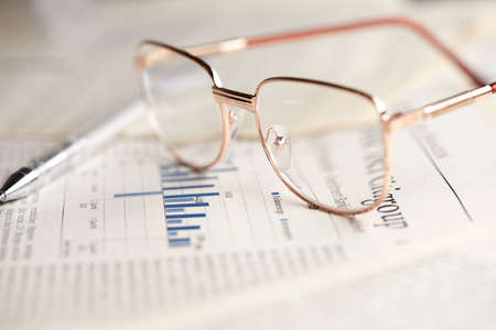 eyeglasses on the newspaper pagesの写真素材