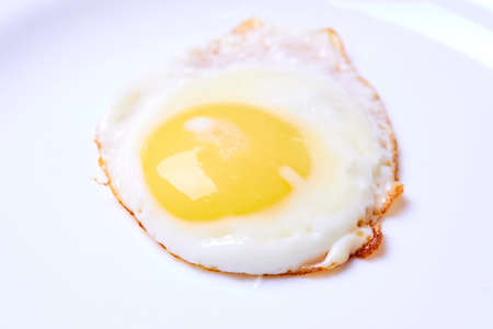 Fried egg on the whiteの写真素材