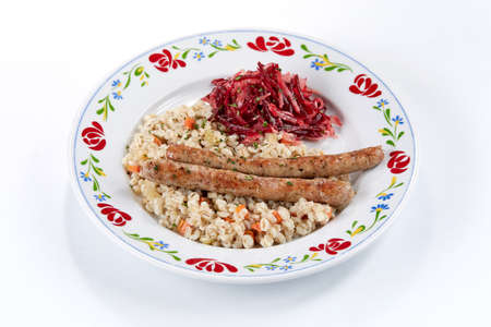 barley with sausage and saladの写真素材